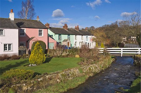 Pastel coloured cottages alongside the beck in Calthwaite, John Peel Country, Cumbria, England, United Kingdom, Europe Stock Photo - Rights-Managed, Code: 841-07082394