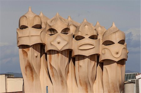 flat roof - Singing chimneys, The Pop Girls, on the roof of La Pedrera (Casa Mila), an apartment block on Passeig de Gracia, designed by Antonio Gaudi, UNESCO World Heritage Site, Barcelona, Catalunya, Spain, Europe Stock Photo - Rights-Managed, Code: 841-07082419
