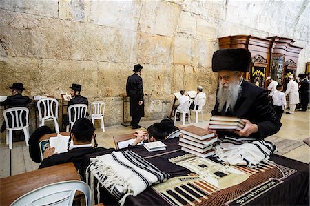 Orthodox Jewish people praying at a synagogue by the Western Wall (Wailing Wall) in the Old City, Jerusalem, Israel, Middle East Stock Photo - Rights-Managed, Code: 841-07082442