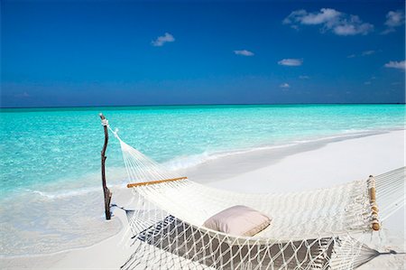 Hammock on tropical beach, Maldives, Indian Ocean, Asia Foto de stock - Con derechos protegidos, Código: 841-07082745