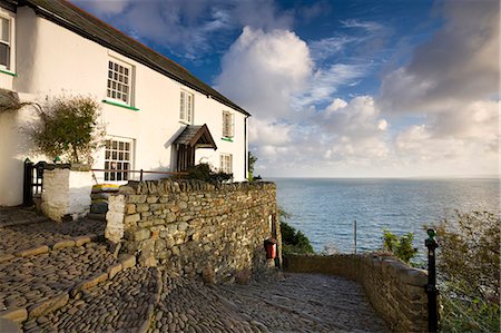 english stone wall - Whitewashed cottage and cobbled lane in the picturesque village of Clovelly, Devon, England, United Kingdom, Europe Stock Photo - Rights-Managed, Code: 841-07082894
