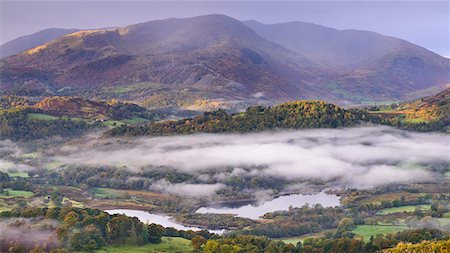 Autumn mist hangs above Elterwater with views beyond to Little Langdale and Wetherlam, Lake District National Park, Cumbria, England, United Kingdom, Europe Stock Photo - Rights-Managed, Code: 841-07082952