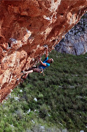 A climber scales cliffs near San Vito Lo Capo, northwest Sicily, Italy, Europe Stock Photo - Rights-Managed, Code: 841-07083071