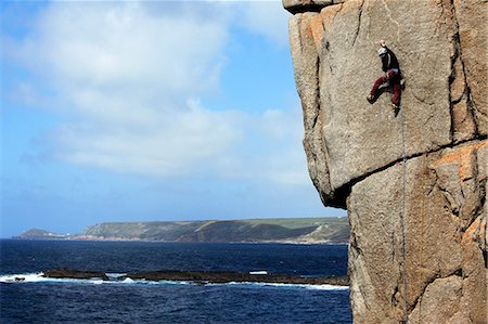 simsearch:841-03675371,k - A climber scales cliffs at Sennen Cove, Cornwall, England, United Kingdom, Europe Fotografie stock - Rights-Managed, Codice: 841-07083084