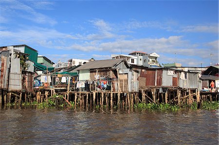 Stilt houses on the waterfront, Can Tho, Mekong River, Mekong Delta, Can Tho Province, Vietnam, Indochina, Southeast Asia, Asia Stock Photo - Rights-Managed, Code: 841-07083109