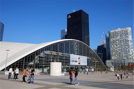 person walking horizon - CNIT building at La Defense business district, Paris, France, Europe Stock Photo - Rights-Managed, Code: 841-07083255