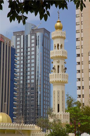 Mosque and contemporary architecture, Abu Dhabi, United Arab Emirates, Middle East Stock Photo - Rights-Managed, Code: 841-07083972