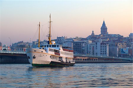 Ferry boat in Golden Horn with Galata Tower in background, Istanbul, Turkey, Europe Stock Photo - Rights-Managed, Code: 841-07204377