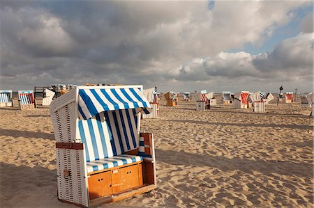 Beach chairs on the beach of Sankt Peter Ording, Eiderstedt Peninsula, Nordfriesland, Schleswig Holstein, Germany, Europe Photographie de stock - Rights-Managed, Code: 841-07204709