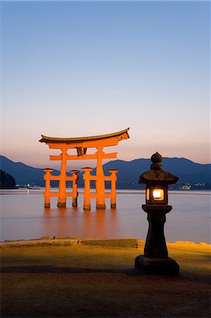 The famous vermillion coloured floating torii gate, Itsuku-shima Shrine, UNESCO World Heritage Site, Miyajima, Honshu, Japan, Asia Stock Photo - Rights-Managed, Code: 841-07205739