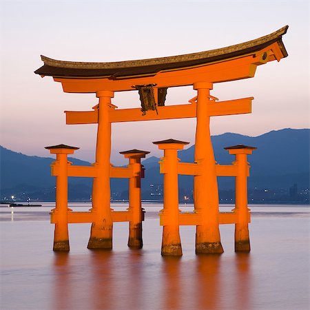 The famous vermillion coloured floating torii gate, Itsuku-shima Shrine, UNESCO World Heritage Site, Miyajima, Honshu, Japan, Asia Stock Photo - Rights-Managed, Code: 841-07205740