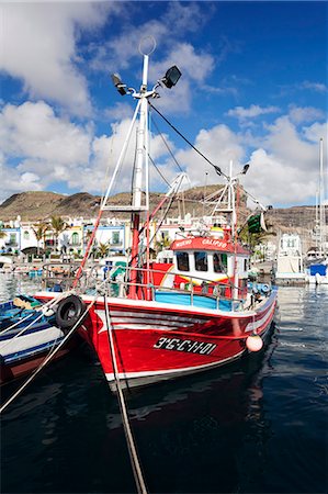 Fishing boat at the old port of Puerto de Mogan, Gran Canaria, Canary Islands, Spain, Atlantic, Europe Photographie de stock - Rights-Managed, Code: 841-07201569