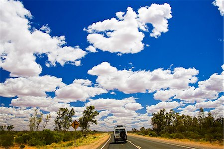 Four-wheel-drive vehicle on road in the Red Centre, Australia Stock Photo - Rights-Managed, Code: 841-07201611