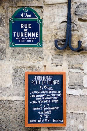 Street sign and Petit Dejeuner brasserie board, rue de Turenne, 4th arondissement, Paris, France Stock Photo - Rights-Managed, Code: 841-07201775