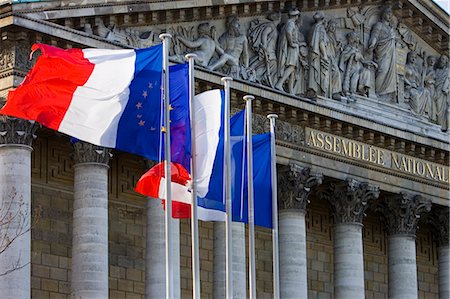 Flags fly on flagpoles outside Assembl̩e Nationale, Palais Bourbon, Central Paris, France Stock Photo - Rights-Managed, Code: 841-07201796