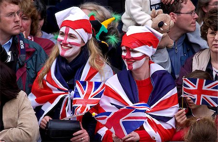 simsearch:841-02920454,k - Enthusiastic patriots wearing Union Jack flags and England flag symbols painted on their faces, London, England Foto de stock - Con derechos protegidos, Código: 841-07201836