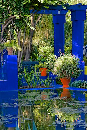 simsearch:841-07590115,k - Coloured pots and plants reflected in water basin, in Majorelle Garden, Marrakech, Morocco, North Africa, Africa Stock Photo - Rights-Managed, Code: 841-07202138