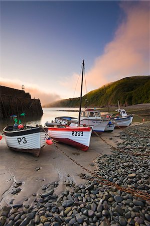 simsearch:841-07202264,k - Fishing vessels beached at low tide in Clovelly harbour, Devon, England, United Kingdom, Europe Stock Photo - Rights-Managed, Code: 841-07202265