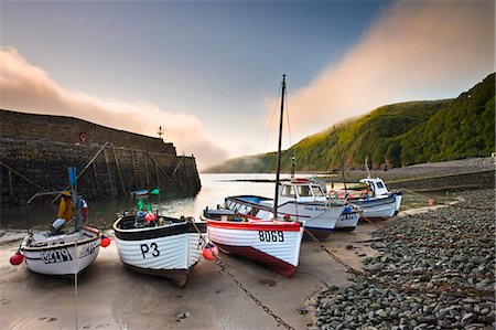 simsearch:841-07782189,k - Fishing vessels beached at low tide in Clovelly harbour, Devon, England, United Kingdom, Europe Stock Photo - Rights-Managed, Code: 841-07202266