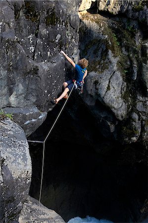 pemberton - A climber tackles an overhang above Nairn Falls, near Pemberton, British Columbia, Canada, North America Fotografie stock - Rights-Managed, Codice: 841-07202281