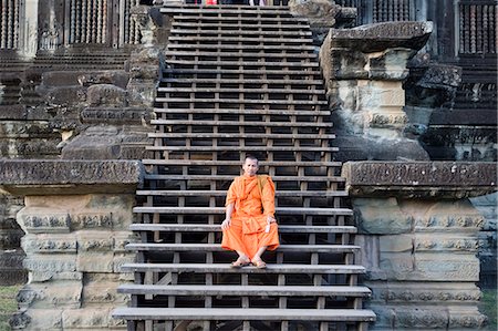 picture of monk - Monk sitting on steps, Angkor Wat, Angkor, UNESCO World Heritage Site, Siem Reap, Cambodia, Indochina, Southeast Asia, Asia Stock Photo - Rights-Managed, Code: 841-07202371