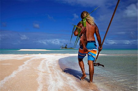 Fishing the traditional way with a harpoon, at the White Sands, Tetamanu Pass, Fakarava Island, Tuamotu archipelago, French Polynesia, Pacific Photographie de stock - Rights-Managed, Code: 841-07202404