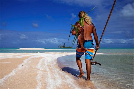 polinesia - Fishing the traditional way with a harpoon, at the White Sands, Tetamanu Pass, Fakarava Island, Tuamotu archipelago, French Polynesia, Pacific Photographie de stock - Rights-Managed, Code: 841-07202404