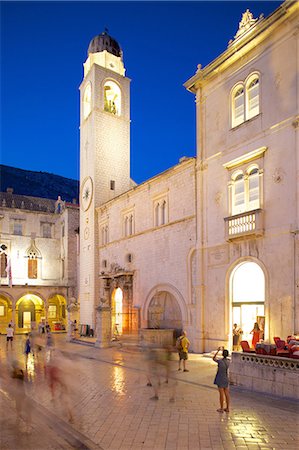 Clock tower and restaurants at dusk, Stradun, UNESCO World Heritage Site, Dubrovnik, Dalmatian Coast, Dalmatia, Croatia, Europe Stock Photo - Rights-Managed, Code: 841-07202477