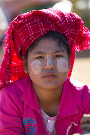 Young Pa-O tribe woman wearing traditional Thanaka sun block paste, Thaung Tho tribal market, Inle Lake, Shan State, Myanmar (Burma), Asia Stock Photo - Rights-Managed, Code: 841-07202530