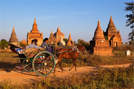 Wooden horse cart taking tourists around Bagan temples, Bagan (Pagan), Central Myanmar, Myanmar (Burma), Asia Stock Photo - Rights-Managed, Code: 841-07202601