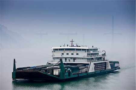 river and pollution - Transportation of trucks with freight and cargo, by boat on Yangtze River, China Stock Photo - Rights-Managed, Code: 841-07354809