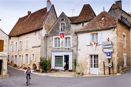french culture - Cyclist in traditional French village of Angles Sur L'Anglin, Vienne, near Poitiers, France Stock Photo - Rights-Managed, Code: 841-07354875