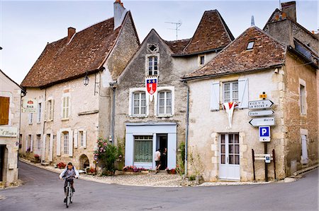 french ethnicity - Cyclist in traditional French village of Angles Sur L'Anglin, Vienne, near Poitiers, France Stock Photo - Rights-Managed, Code: 841-07354875