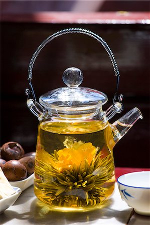 Flower infused tea and traditional snacks in the Huxinting Teahouse, Yu Garden Bazaar Market, Shanghai, China Stock Photo - Rights-Managed, Code: 841-07457285