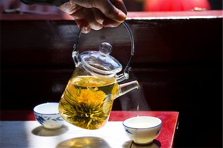 Flower infused tea being poured in the Huxinting Teahouse, Yu Garden Bazaar Market, Shanghai, China Stock Photo - Rights-Managed, Code: 841-07457286