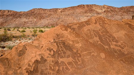 Rock petroglyphs in the sandstone rock at Twyfelfontein, UNESCO World Heritage Site, Namibia, Africa Photographie de stock - Rights-Managed, Code: 841-07457845