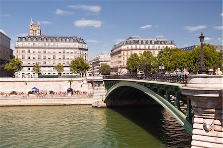 paris bridges - Pont d'Arcole with the annual Paris Plage on the banks of the River Seine, Paris, France, Europe Stock Photo - Rights-Managed, Code: 841-07457924