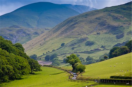 Car motoring along winding road through picturesque valley at Llanfihangel, Snowdonia, Gwynedd, Wales Photographie de stock - Rights-Managed, Code: 841-07523795
