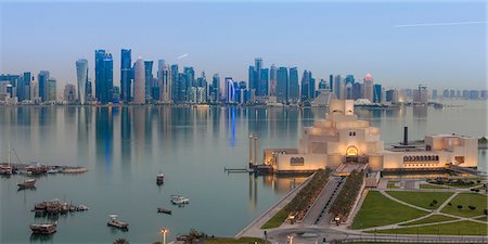 skyline doha - Museum of Islamic Art with West Bay skyscrapers in background, Doha, Qatar, Middle East Stock Photo - Rights-Managed, Code: 841-07540332