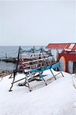 simsearch:6102-06965682,k - Stockfish cod drying on traditional racks, hjell, in the Arctic Circle on the island of Ringvassoya in region of Tromso, Northern Norway Photographie de stock - Rights-Managed, Code: 841-07540698