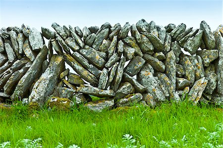 dike - Traditional dry stone wall, vertical sloping stones, in field in The Burren, County Clare, West of Ireland Stock Photo - Rights-Managed, Code: 841-07540807