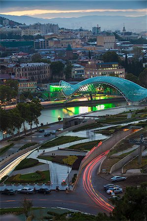 View towards Rike Park and Peace Bridge (Bridge of Peace) over Mtkvari (Kura) River and the city, Tbilisi, Georgia, Caucasus, Central Asia, Asia Stock Photo - Rights-Managed, Code: 841-07589782