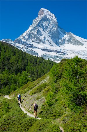 simsearch:841-07589928,k - Hikers on walking trail below the Matterhorn mountain in the Swiss Alps near Zermatt, Valais, Switzerland, Europe Stock Photo - Rights-Managed, Code: 841-07589898