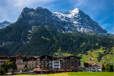 eiger - The town of Grindelwald beneath the Eiger North Face in the Swiss Alps, Bernese Oberland, Switzerland, Europe Stock Photo - Rights-Managed, Code: 841-07589914