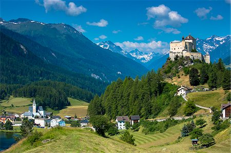 fontana - Tarasp Castle and Fontana village surrounded by larch forest in the Lower Engadine Valley, Switzerland, Europe Stock Photo - Rights-Managed, Code: 841-07589925