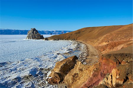 frozen lake - Shaman rock, Maloe More (Little Sea), frozen lake during winter, Olkhon island, Lake Baikal, UNESCO World Heritage Site, Irkutsk Oblast, Siberia, Russia, Eurasia Stock Photo - Rights-Managed, Code: 841-07590084