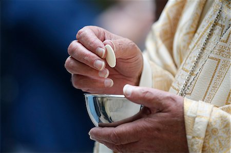 priest communion - Holy Communion, Catholic Mass, Haute-Savoie, France, Europe Stock Photo - Rights-Managed, Code: 841-07590406