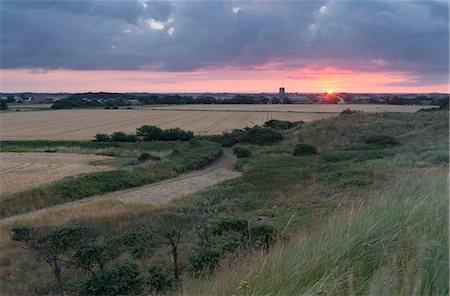 farm field grass not people - Sunset over the small village of Waxham, Norfolk, England, United Kingdom, Europe Stock Photo - Rights-Managed, Code: 841-07590502