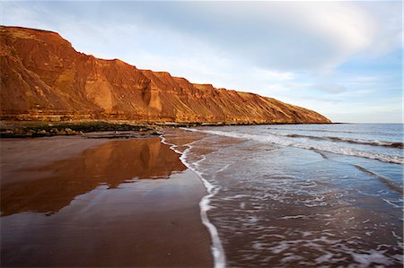 Carr Naze reflected on the wet sands, Filey Brigg, Filey, North Yorkshire, Yorkshire, England, United Kingdom, Europe Foto de stock - Con derechos protegidos, Código: 841-07590528