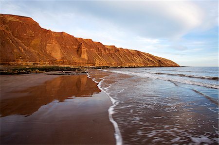 precipice not nobody - Carr Naze reflected on the wet sands, Filey Brigg, Filey, North Yorkshire, Yorkshire, England, United Kingdom, Europe Stock Photo - Rights-Managed, Code: 841-07590528